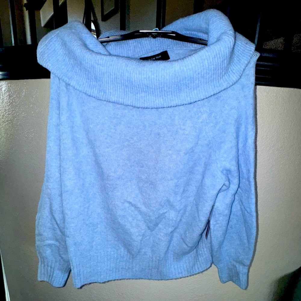 New with tags, soft baby blue dressy sweater, size L, La Cite’ Mode brand.